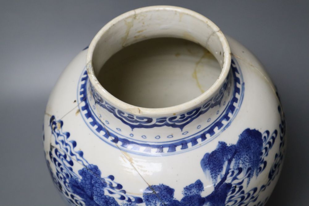 A Chinese Kangxi period blue and white baluster vase, repaired, 35cm